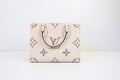 Louis Vuitton Bicolor On-the-Go PM Handbag in White