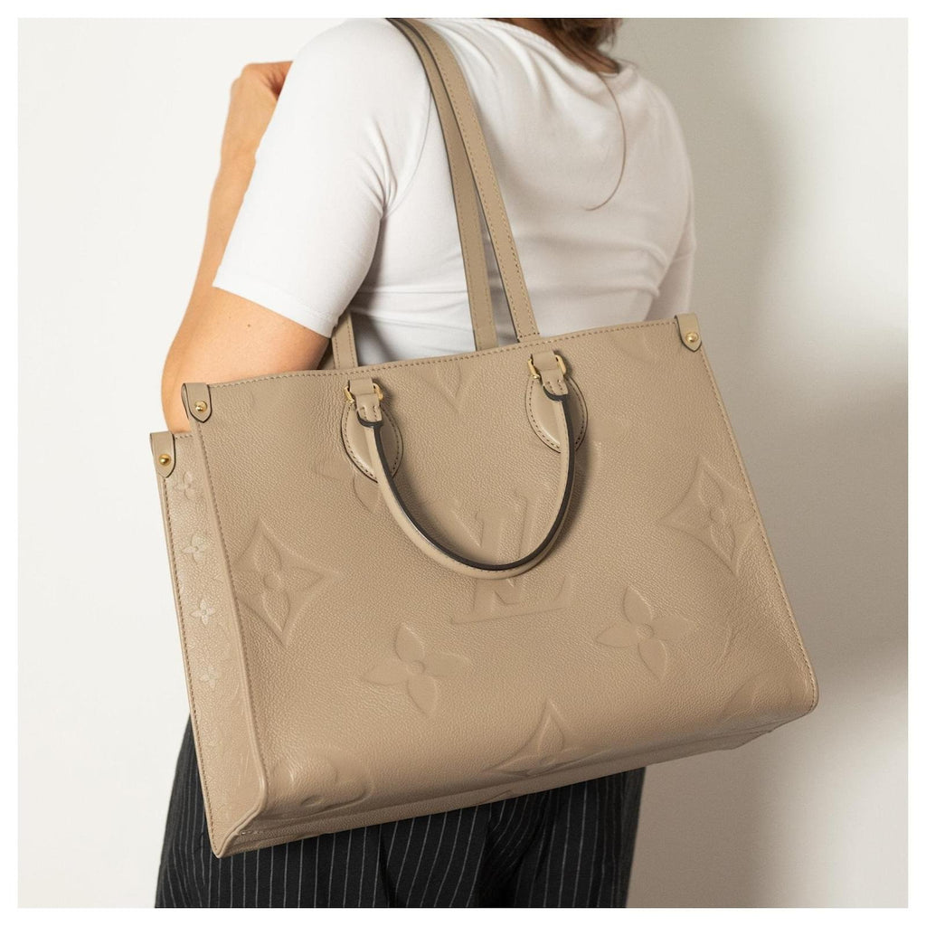 Louis Vuitton On-the-Go GM Handbag in Beige
