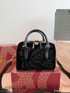 Tory Burch Embellished Barrel Bag in Black