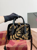 Tory Burch Gold Embellished Barrel Bag in Black