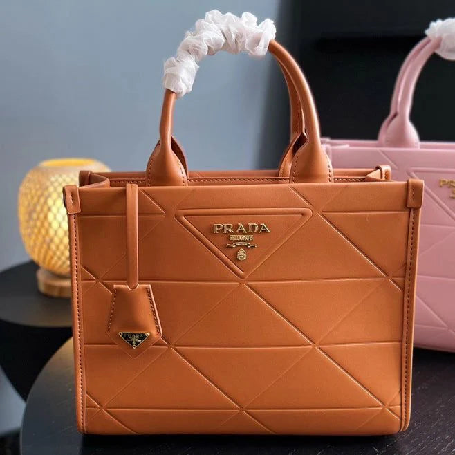 Prada Symbole Leather Tote Bag in Brown