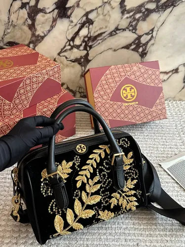 Tory Burch Gold Embellished Barrel Bag in Black
