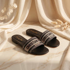 Flat slide sandal studio photo