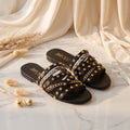 Pointed-toe flat sandal studio photo