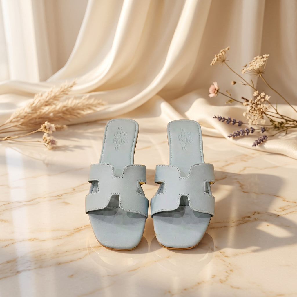 Flat slide sandal studio photo