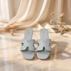 Flat slide sandal studio photo