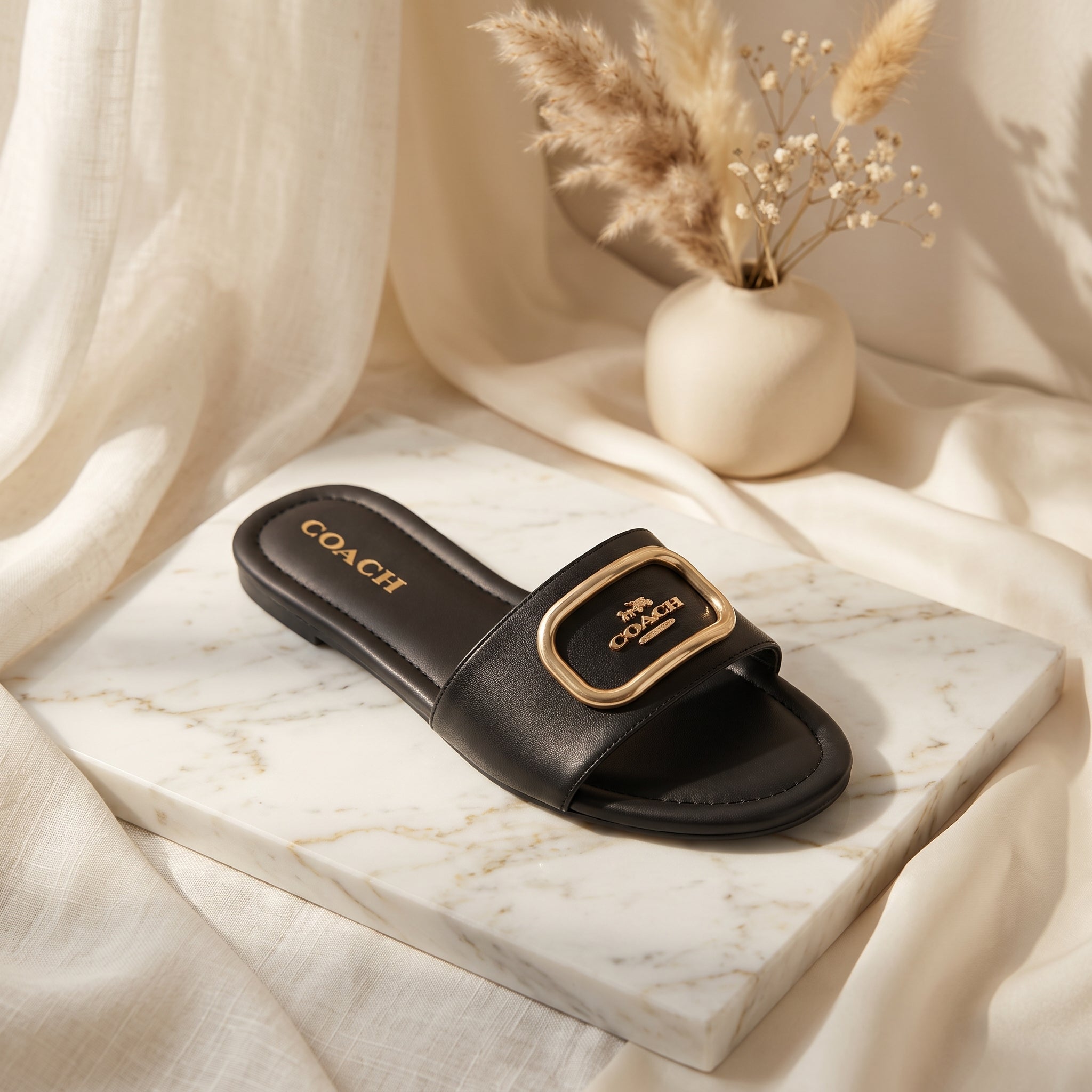 Flat slide sandal studio photo