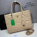 Prada Symbole Leather Tote Bag in Beige