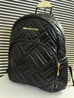 Michael Kors Leather Backpack in Black.