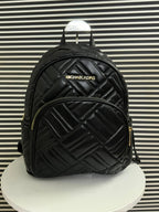 Michael Kors Leather Backpack in Black.