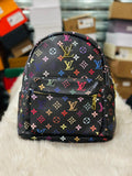 Louis Vuitton Mini Backpack in a Black Colorway with Multicolored Logos.