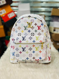 White Louis Vuitton Backpack with Multicolored Monogram Pattern.