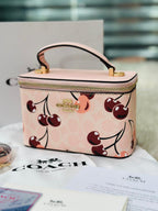 Coach Vanity with Cherry Print.