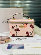 Coach Vanity with Cherry Print.