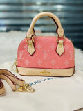 Louis Vuitton Alma BB Mini Handbag in Pink