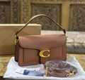 Coach Tabby in Brown Polished Pebble Leather.