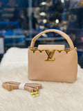 Louis Vuitton Capucines Bag in Beige