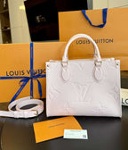 Louis Vuitton OnTheGo PM Tote Bag in Cream