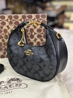 Coach Jonie Bag in Black Signature Canvas