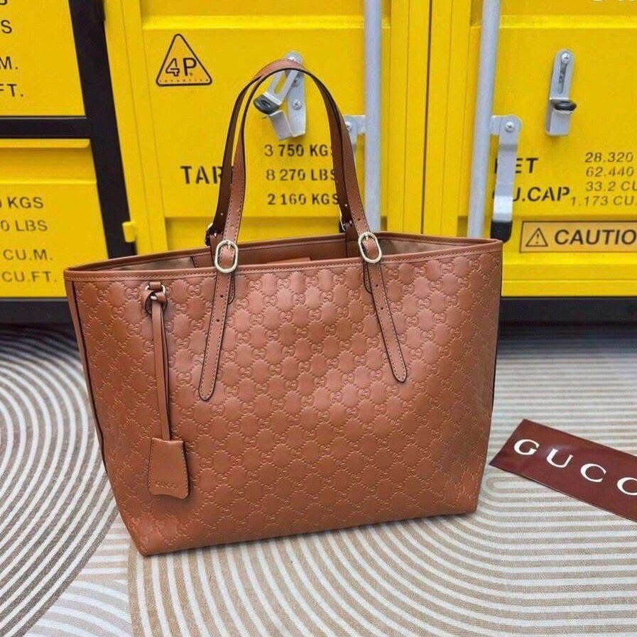 Gucci GG Emblem Large Tote Bag in Brown
