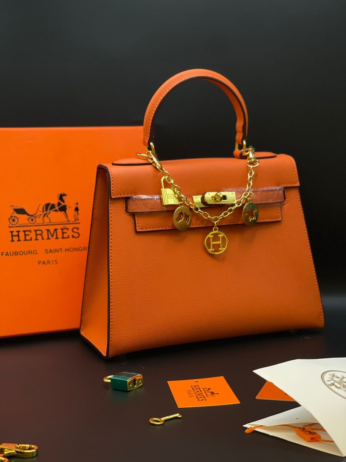 Hermès Kelly Handbag in Vibrant Orange
