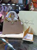 Louis Vuitton Capucines Handbag in Beige