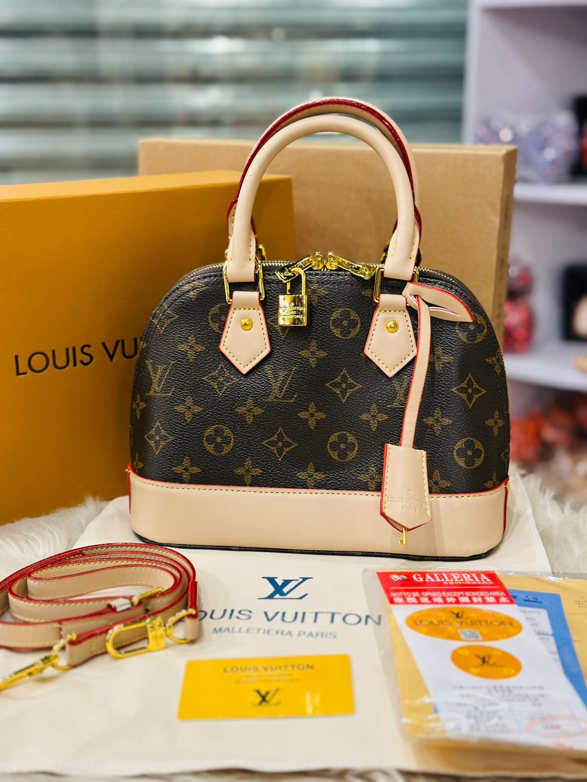 Louis Vuitton Alma BB Handbag in Monogram Canvas