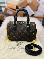 Louis Vuitton Speedy Trunk 20 Bag in Monogram Canvas.