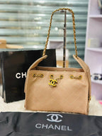 Chanel 25 Small Handbag in Beige
