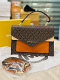 Michael Kors Ludlow Signature Satchel in Brown and Orange