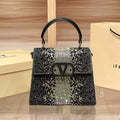 Garavani Vsling Mini Handbag -HB21