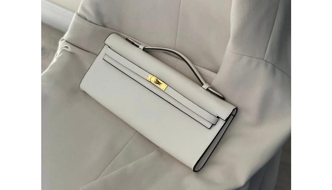 Hermès Kelly Cut Clutch in White