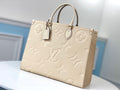 Louis Vuitton On-the-Go GM Handbag in Beige